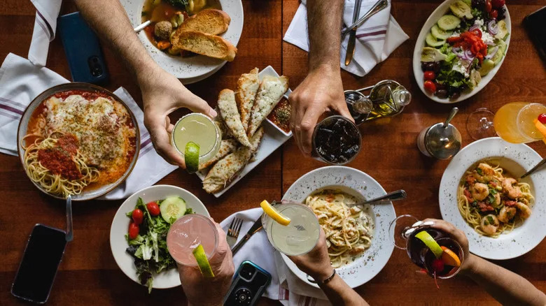 A variety of family style dishes at an Italian restaurant