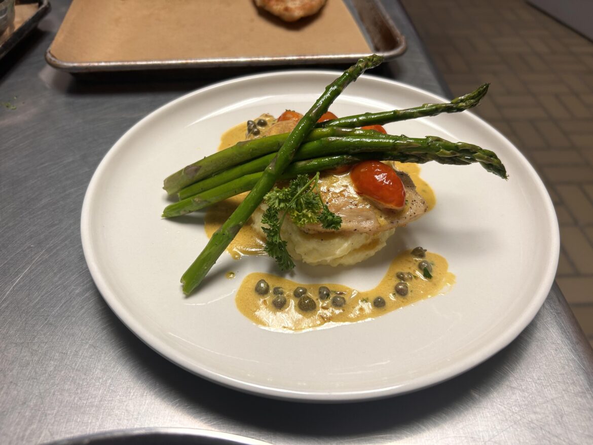Chicken “piccata” blistered tomato’s in a lemon pan sauce with asparagus and potato