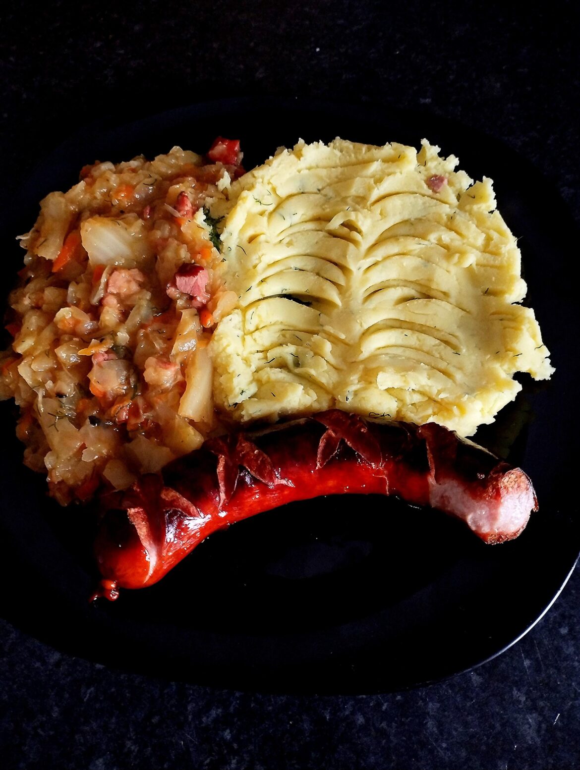 Stewed cabbage with potatoes and sausage