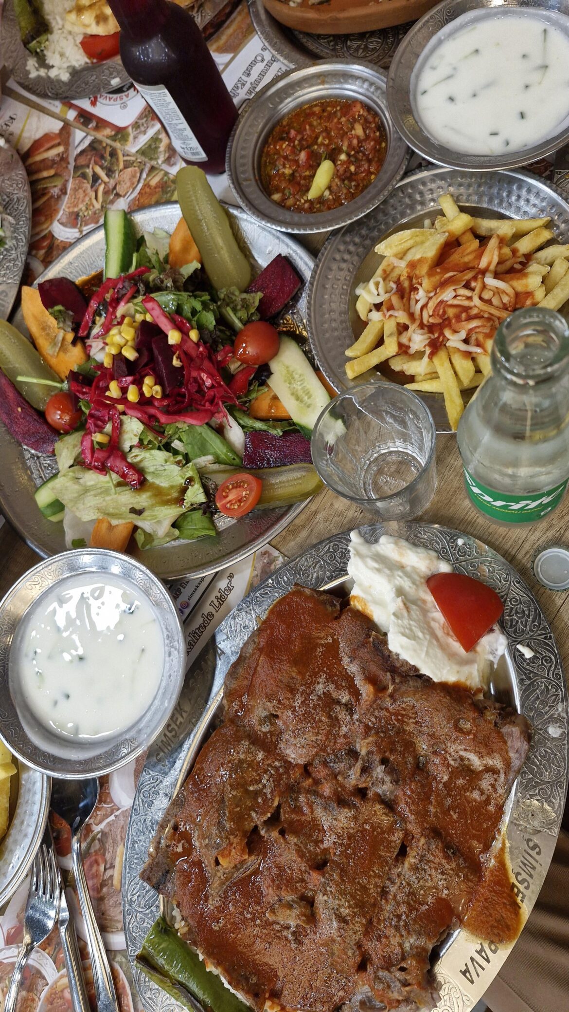 Iskender kebab with side dishes