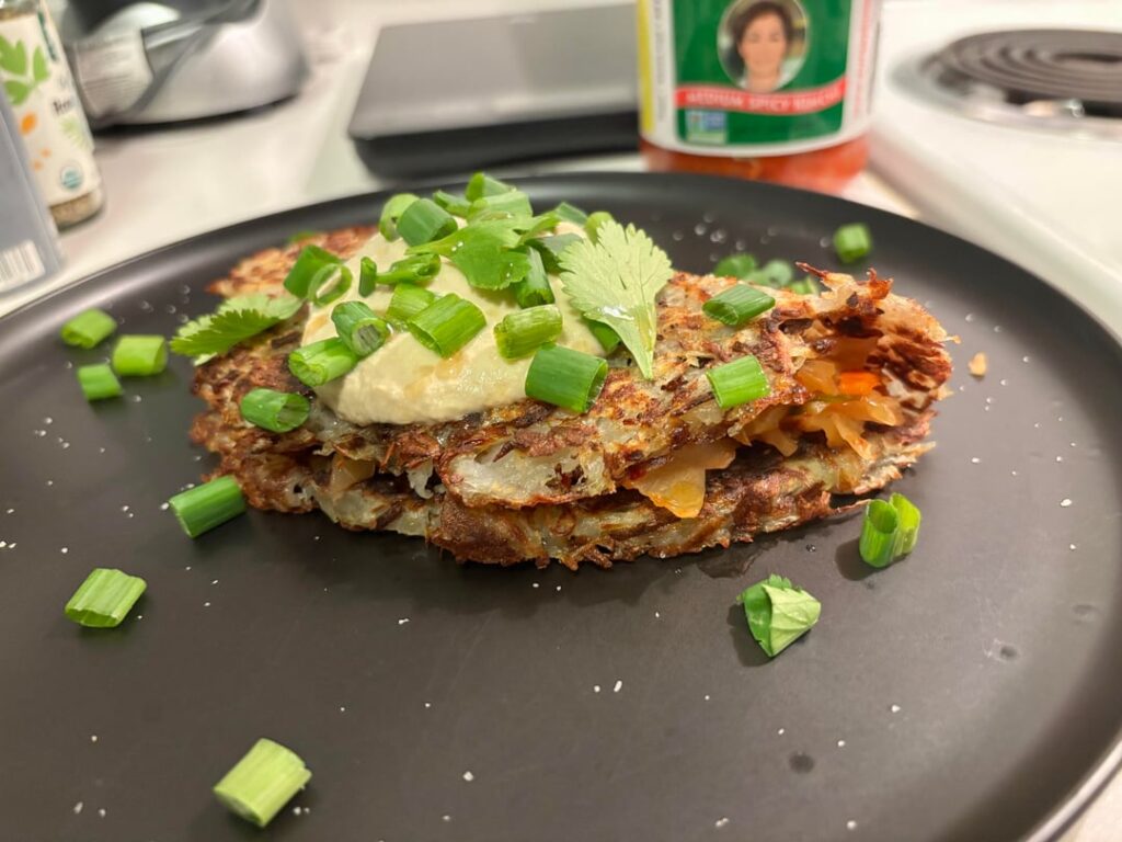 Breakfast for dinner. Hash brown omelet with kimchi and homemade vegan cream sauce