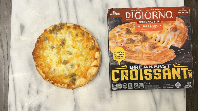 DiGiorno Breakfast Croissant Sausage & Gravy Pizza on serving tray.