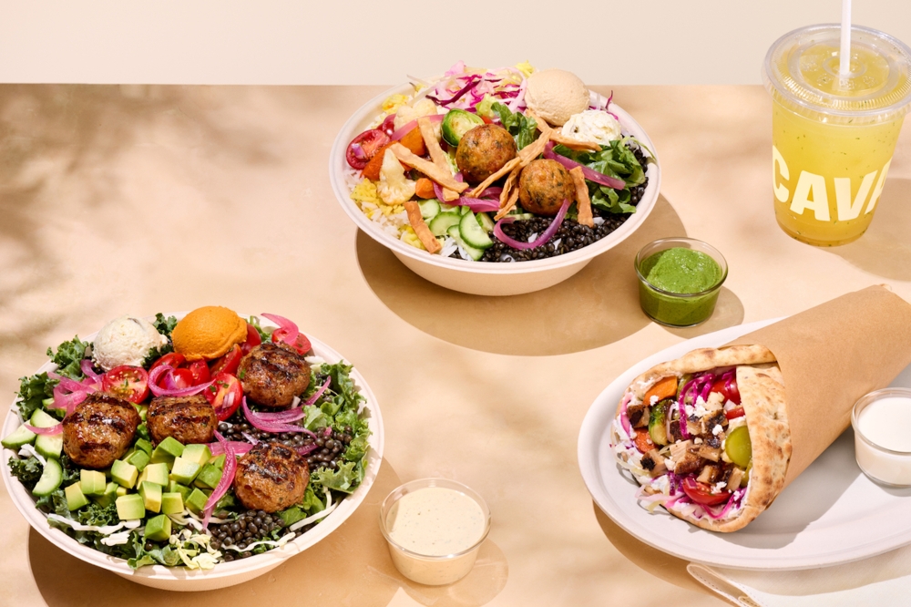 CAVA now open within the Schertz Station development CAVA serves "build-your-own" bowls and pita wraps topped with Greek-inspired items like tzatziki, harissa and various dressings, according to the menu. (Courtesy CAVA)