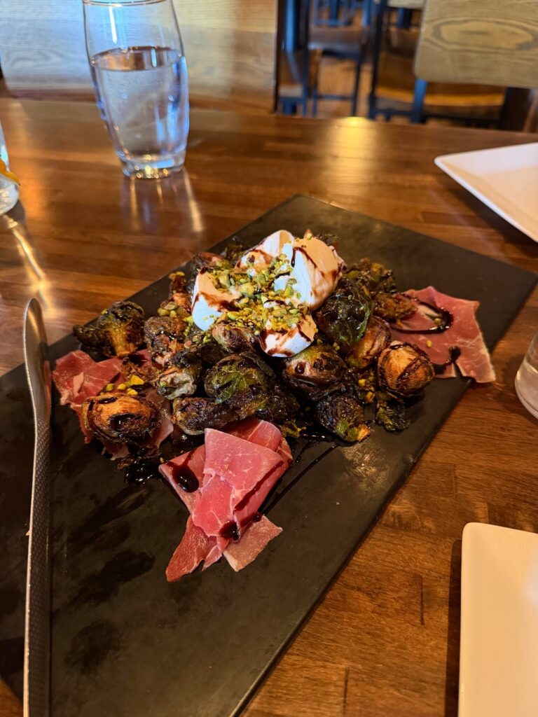 Estimated calories in a cup of these brussel sprouts, and this salad with grilled chicken, butternut squash, dates, apple, goat cheese, pecans and apple cider vinaigrette?