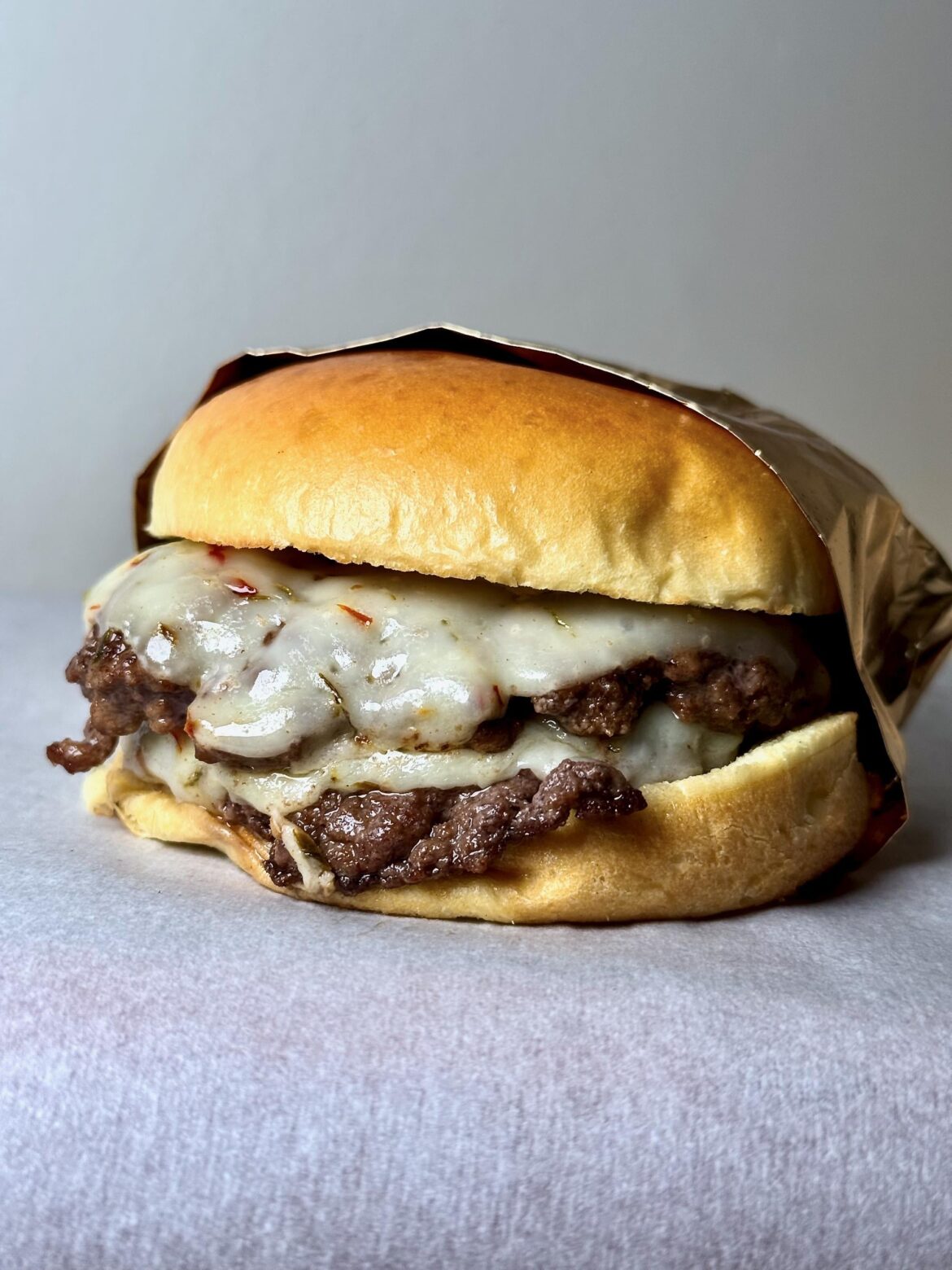 [homemade] Mini double-smash w/ Jalapeño Jack on a brioche bun.