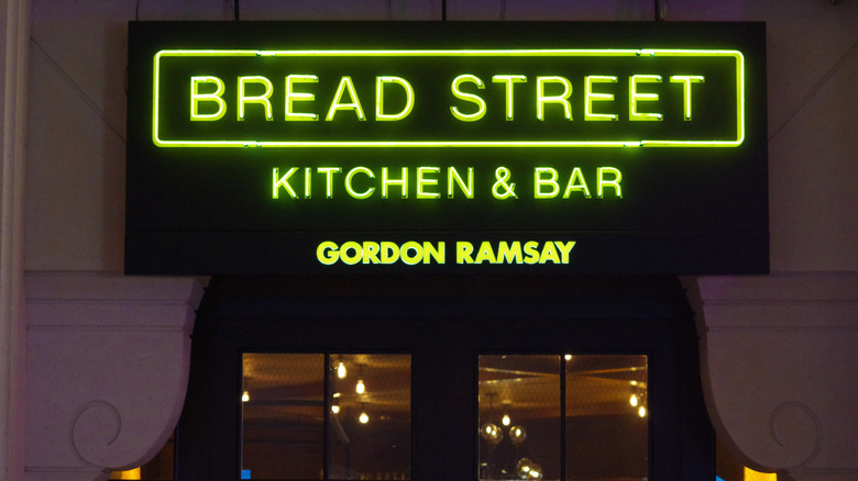 Neon signage at restaurant entrance of Gordon Ramsay Bread Street Kitchen & Bar at Atlantis resort in Dubai