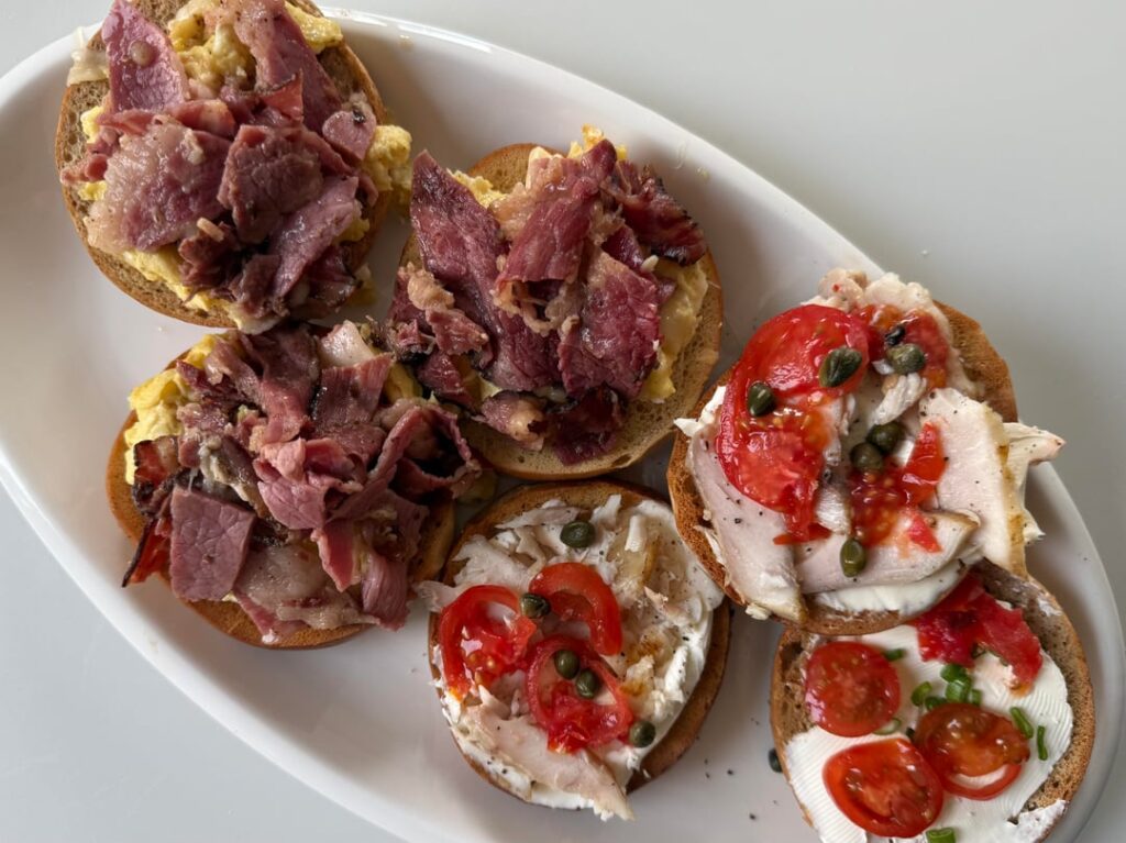 Bagels with mahi mahi, corned beef pastrami and eggs