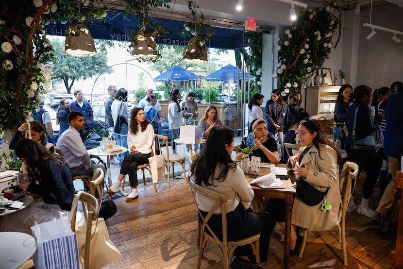 Customers sit at Maman during its grand opening Thursday, Nov. 20, 2025, in Dallas. The line...