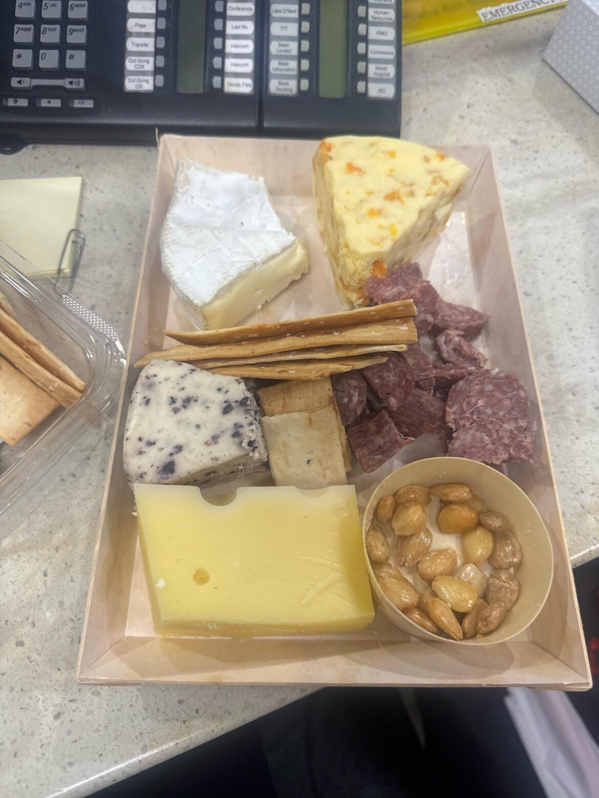 Homemade charcuterie board with random clearance cheese from Ralph's