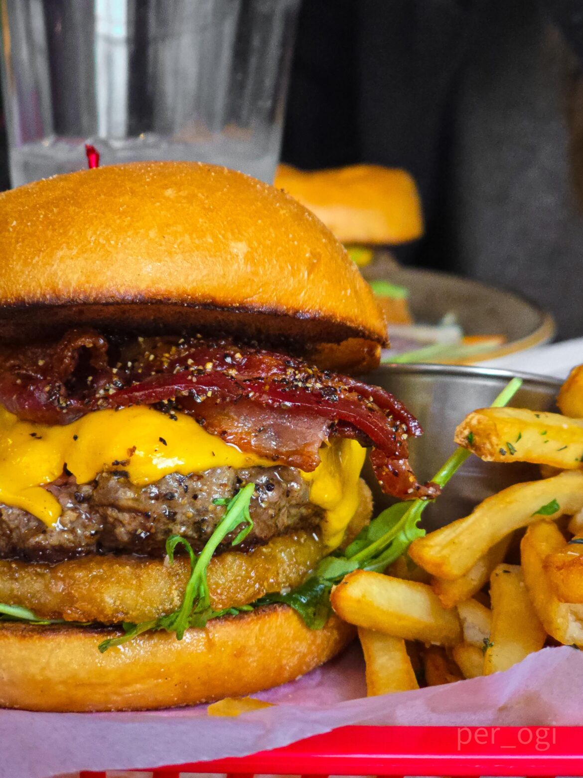 Burger w/ American Cheese, Arugula, Pepper Bacon, Hash browns, Sriracha Maple