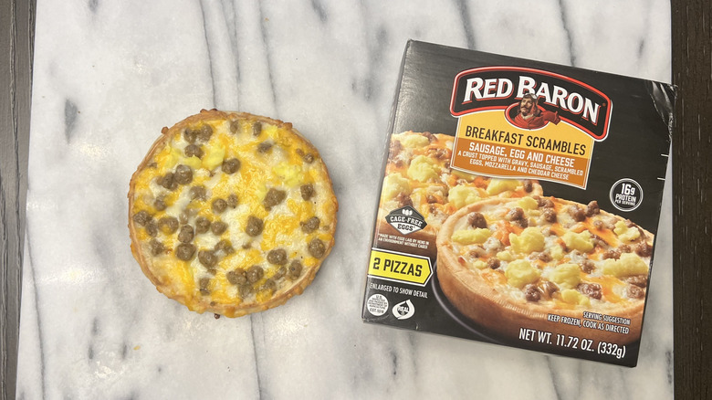 Red Baron Breakfast Scrambles with sausage breakfast pizza on serving tray.