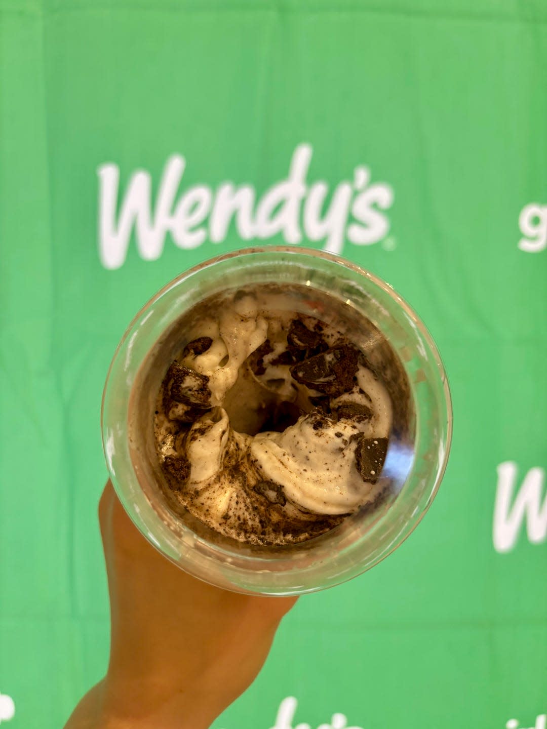 frozen dessert with whipped cream and chocolate cookie crumbles