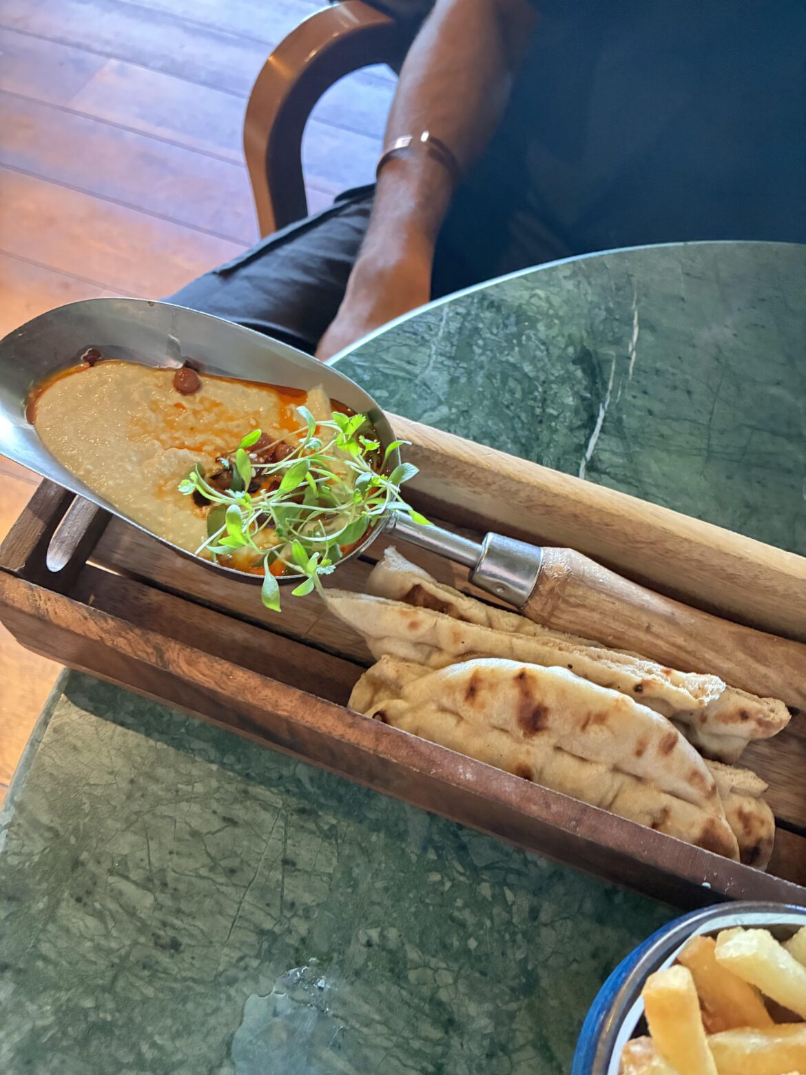 A shovel of hummus