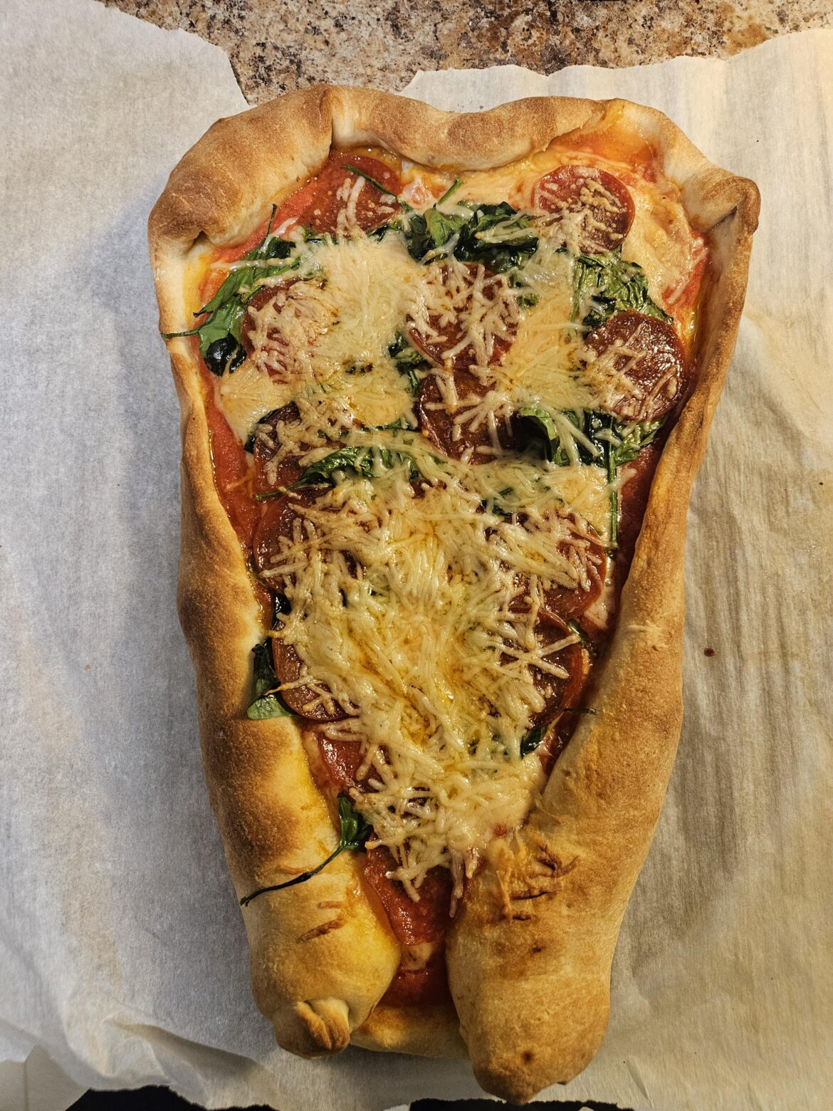 Celebrate Valentine's Day with this "heart" shaped pizza