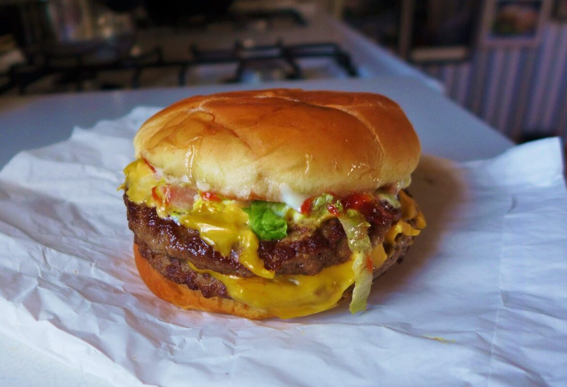 My small local hog dog/burger/shake joint serves up a mighty tasty cheeseburger, double if you please. It always tastes the same, namely, delicious.