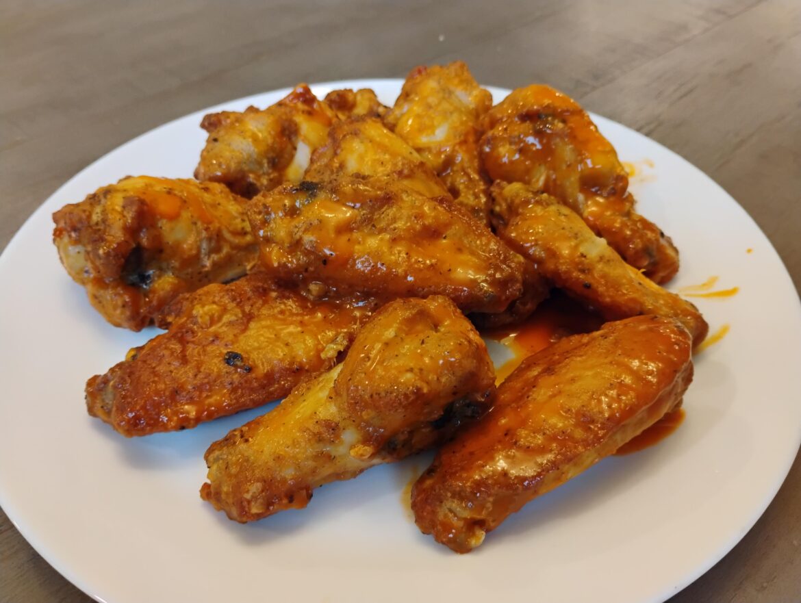 First time trying Costco's Frozen "Crispy Wings". Tossed in Sweet Baby Ray's.