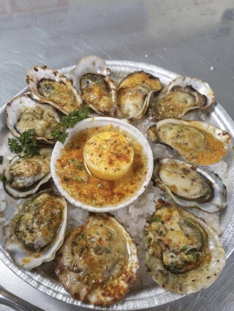 Delicious grilled oyster with garlic butter