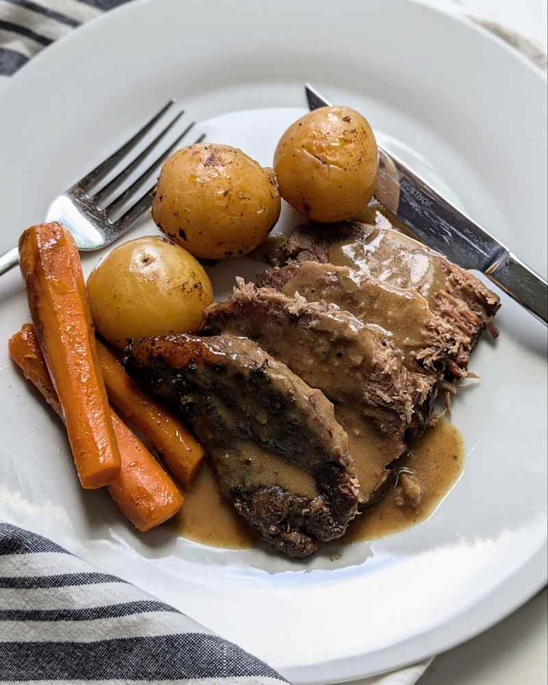 Beef with beef demi glace on top.