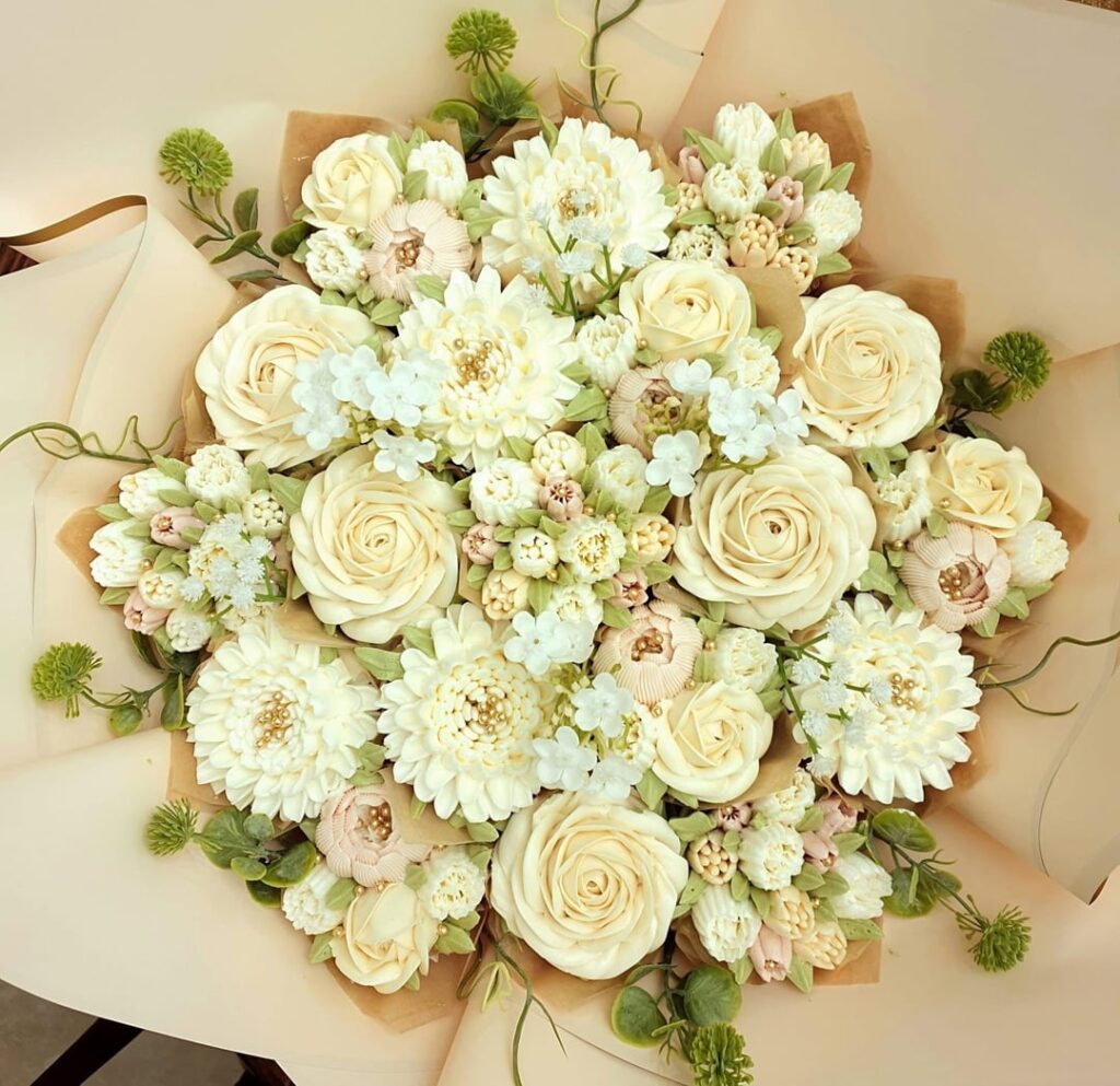 We made a 19 cupcake buttercream flower bouquet for a wedding