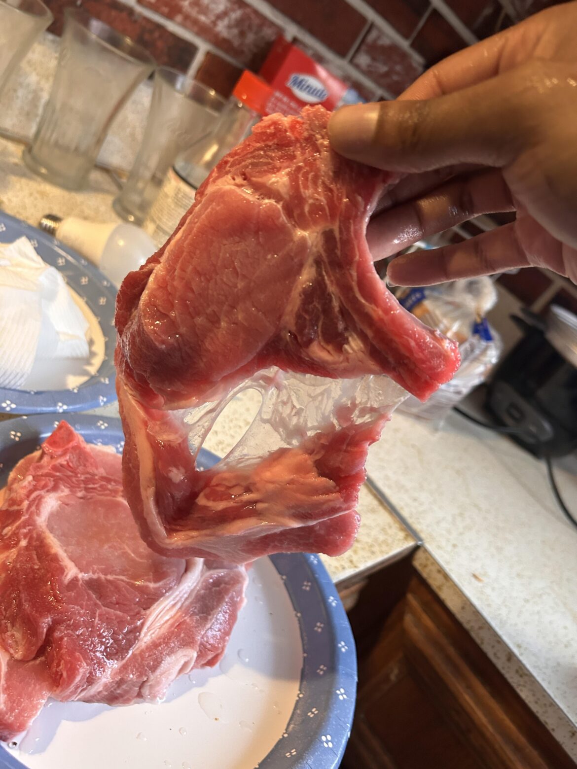 Is this normal? Two of my Pork-chops look like this