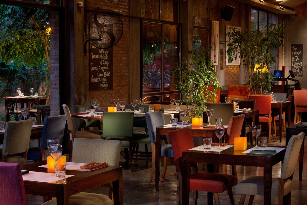 The dining room is moody and inviting at Anna Bistró. © Anna Bistró