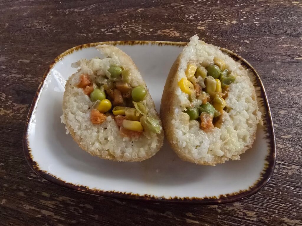Arancini with sprouted peas