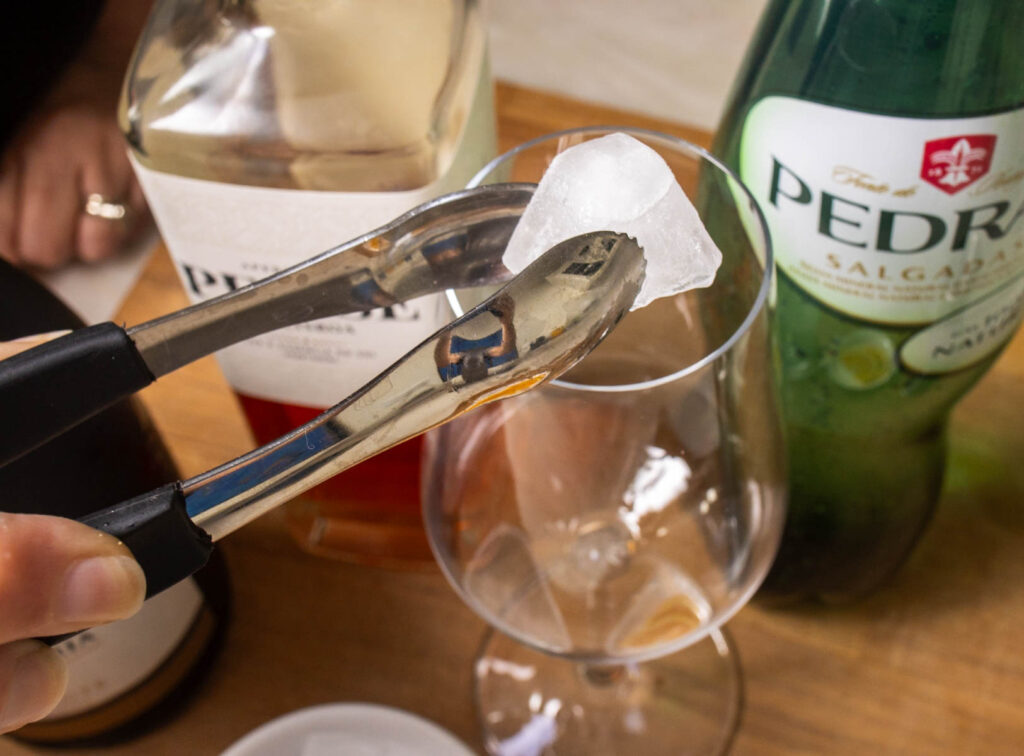 Adding Ice for a Portuguese Spritz