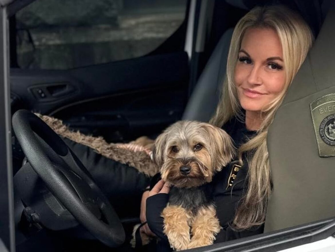 Everett Animal Control Officer Stacia Gorgone and Valentino, a lost dog who was spotted in a local cemetery and later reunited with his family.