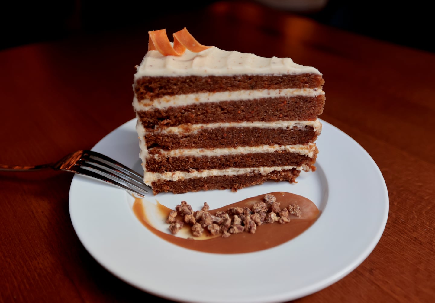 For dessert, there’s a rich five-layer carrot cake with cream cheese frosting, salted caramel sauce, and spiced pecans.  