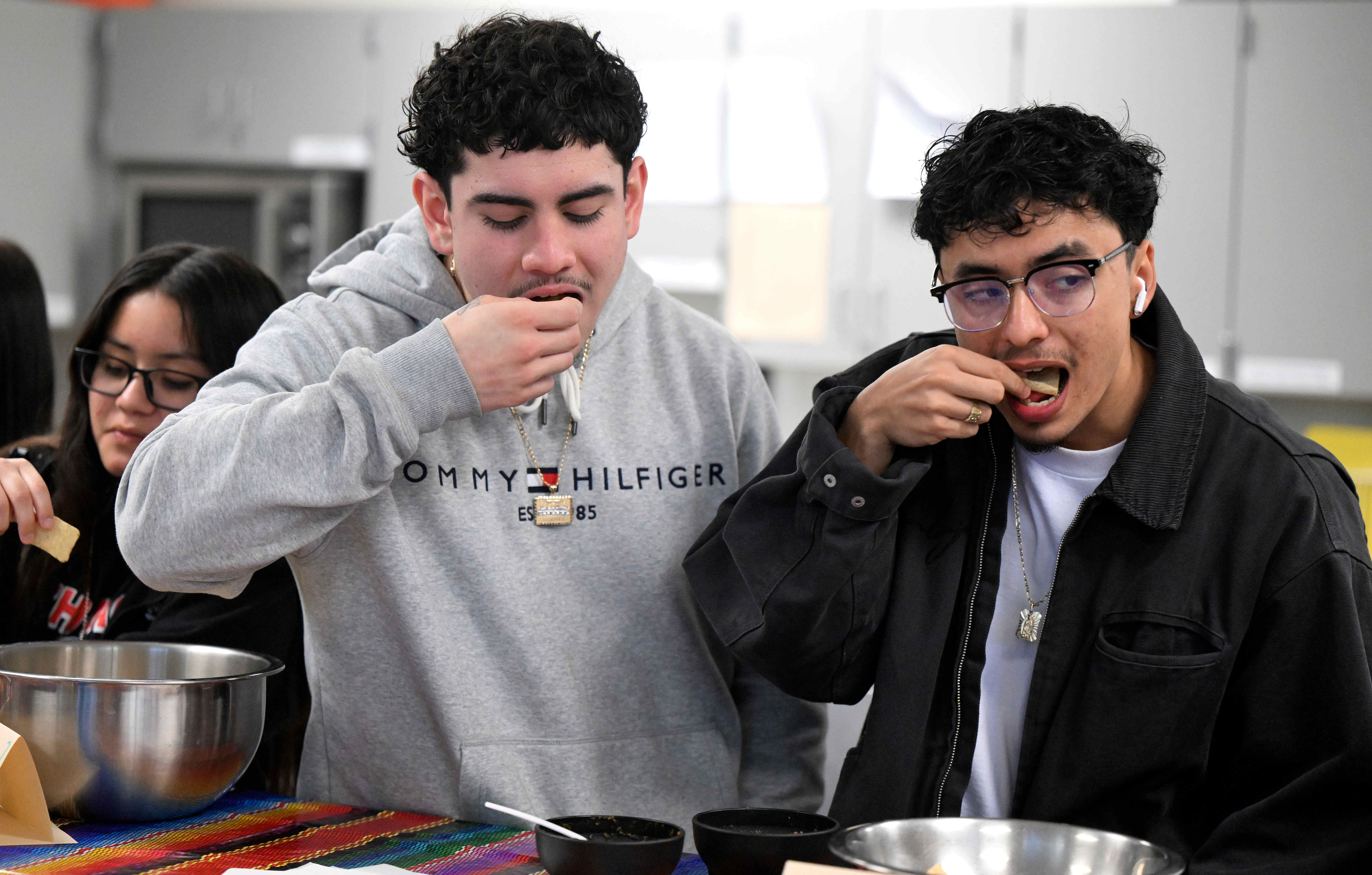Montclair High School senior culinary arts students Elvys Marquez, left,...