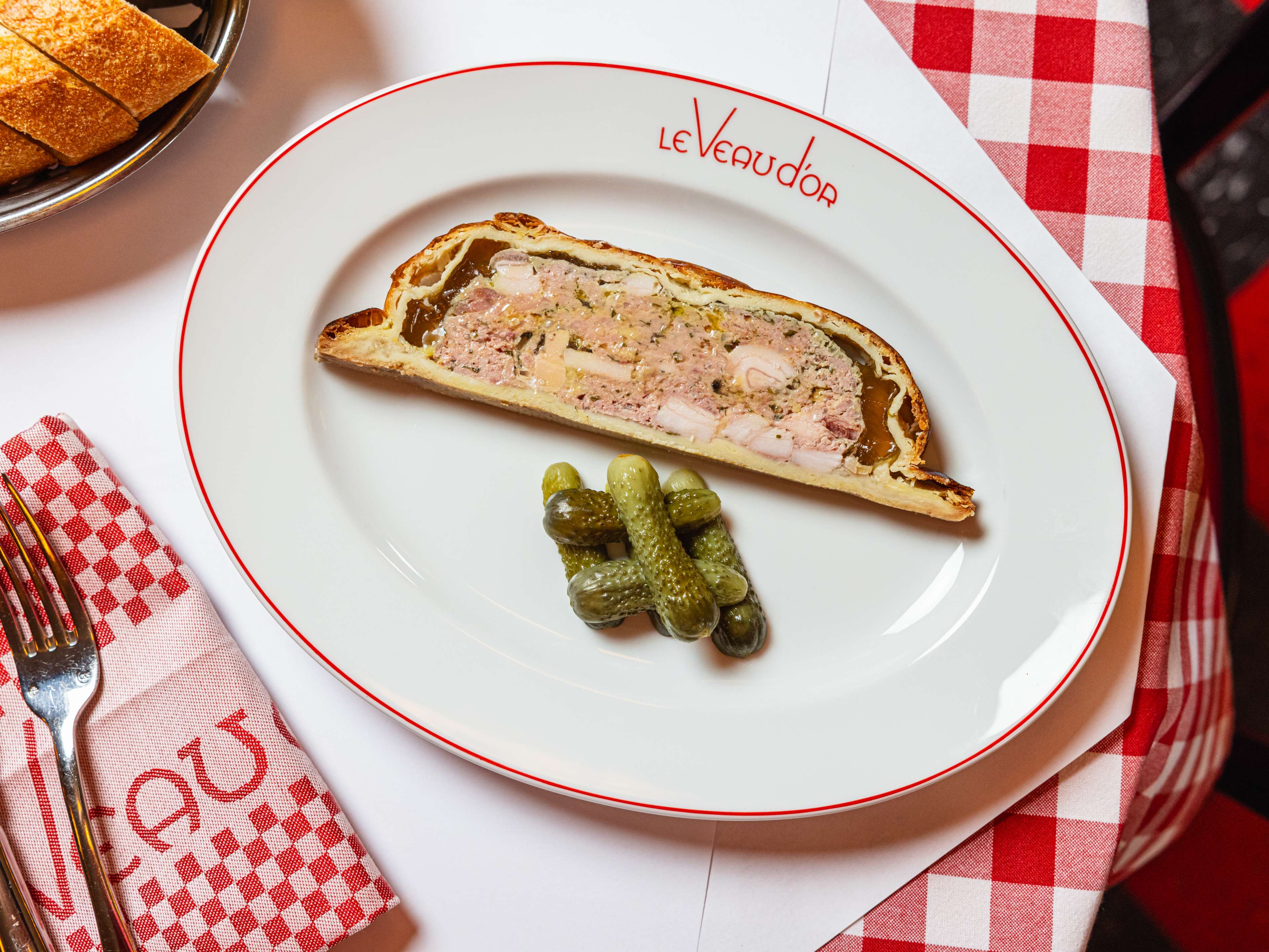 the pate en croute from Le Veau d'or, with a pile log-cabin arranged cornichon