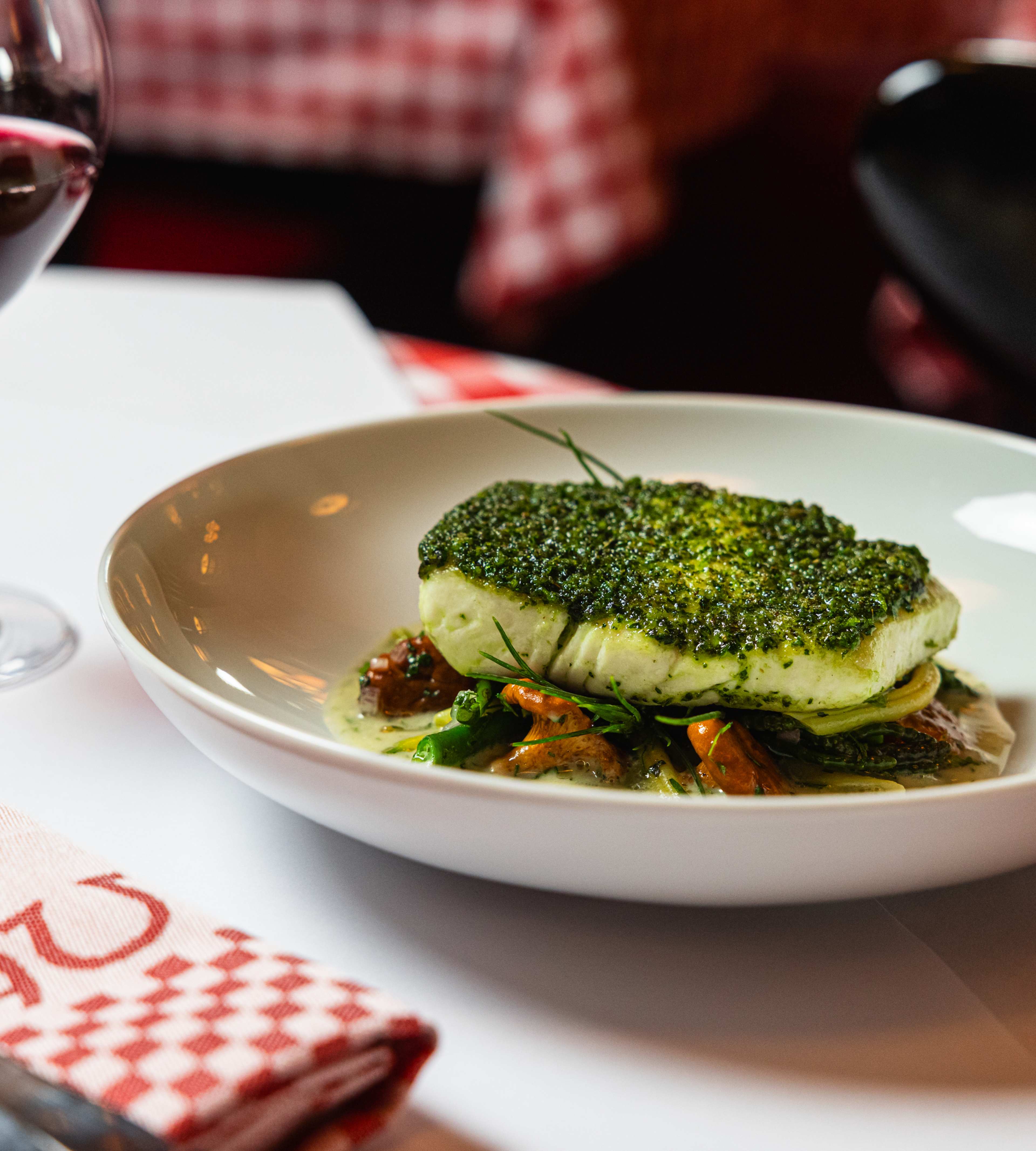 the fish at Le Veau d'Or, dusted with a green breadcrumb topping