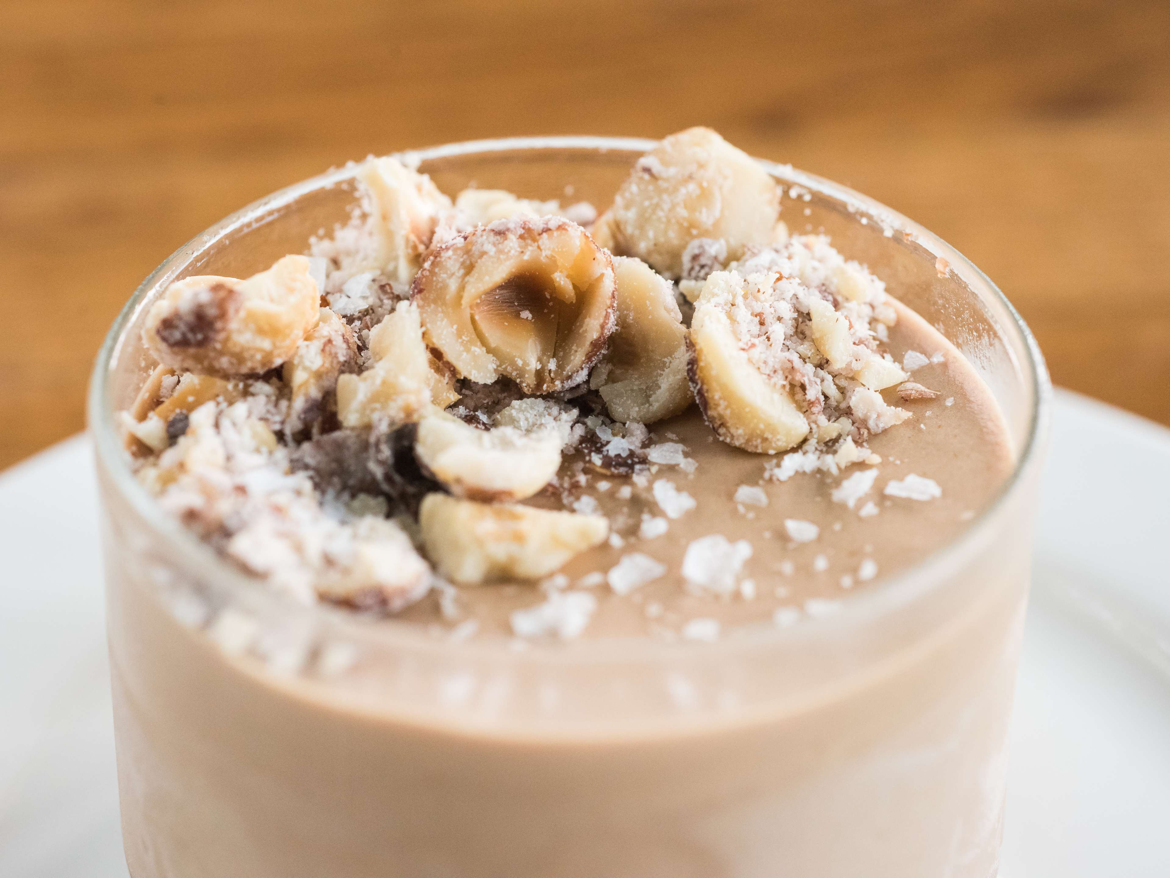 chocolate mousse topped with salt and hazelnuts