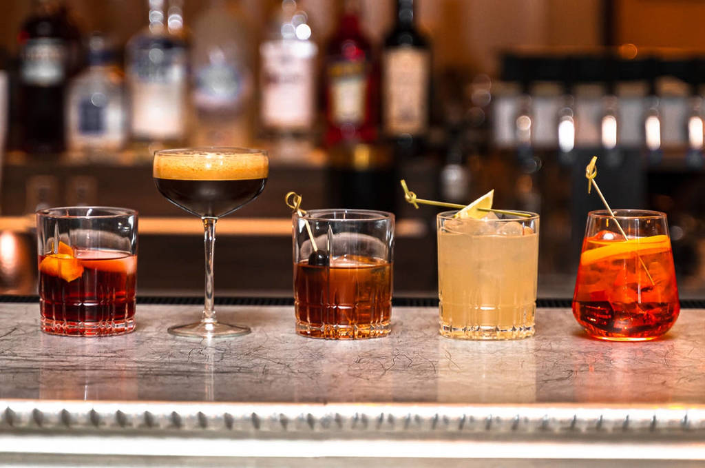 happy hour cocktails on a bar at OLIO E PIÙ in Chicago