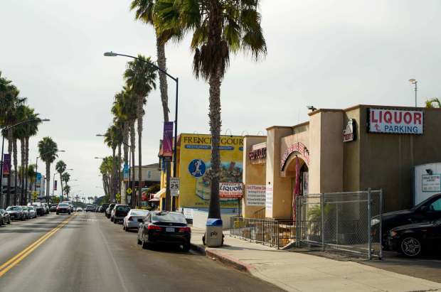 This area on Turquoise Street in north Pacific Beach, including The French Gourmet restaurant, is planned for a 22-story mixed-use tower. (Alejandro Tamayo / The San Diego Union-Tribune)