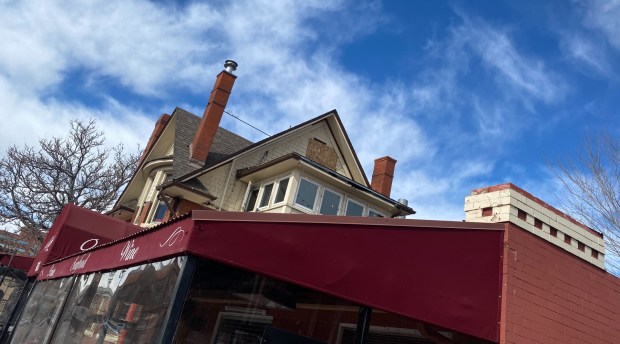 A plywood board covers a broken third-story window at Odyssey Italian Restaurant on Capitol Hill in Denver, on Wednesday, Feb. 18, 2026. (John Wenzel / The Denver Post)