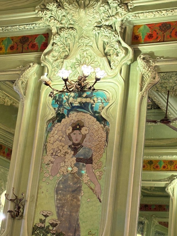 A glass artisan created four nymphs portraying summer, fall, winter and spring for the walls of Bouillon Julien. (Janet Podolak - For The News-Herald)