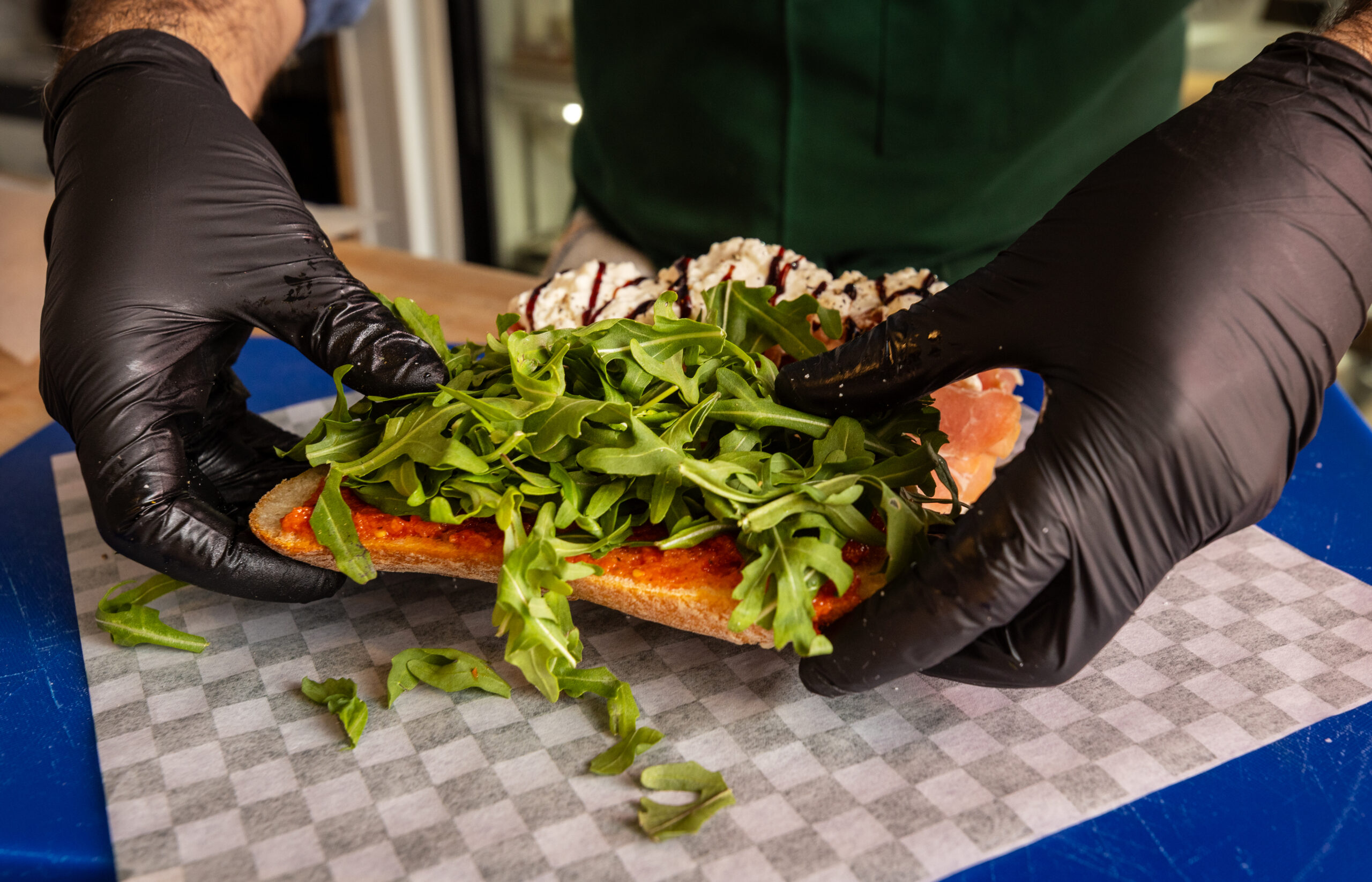 Making a Genero sandwich at Genero’s Deli Friday, Jan. 30, 2026 in Sebastopol’s Barlow district. (John Burgess/The Press Democrat)