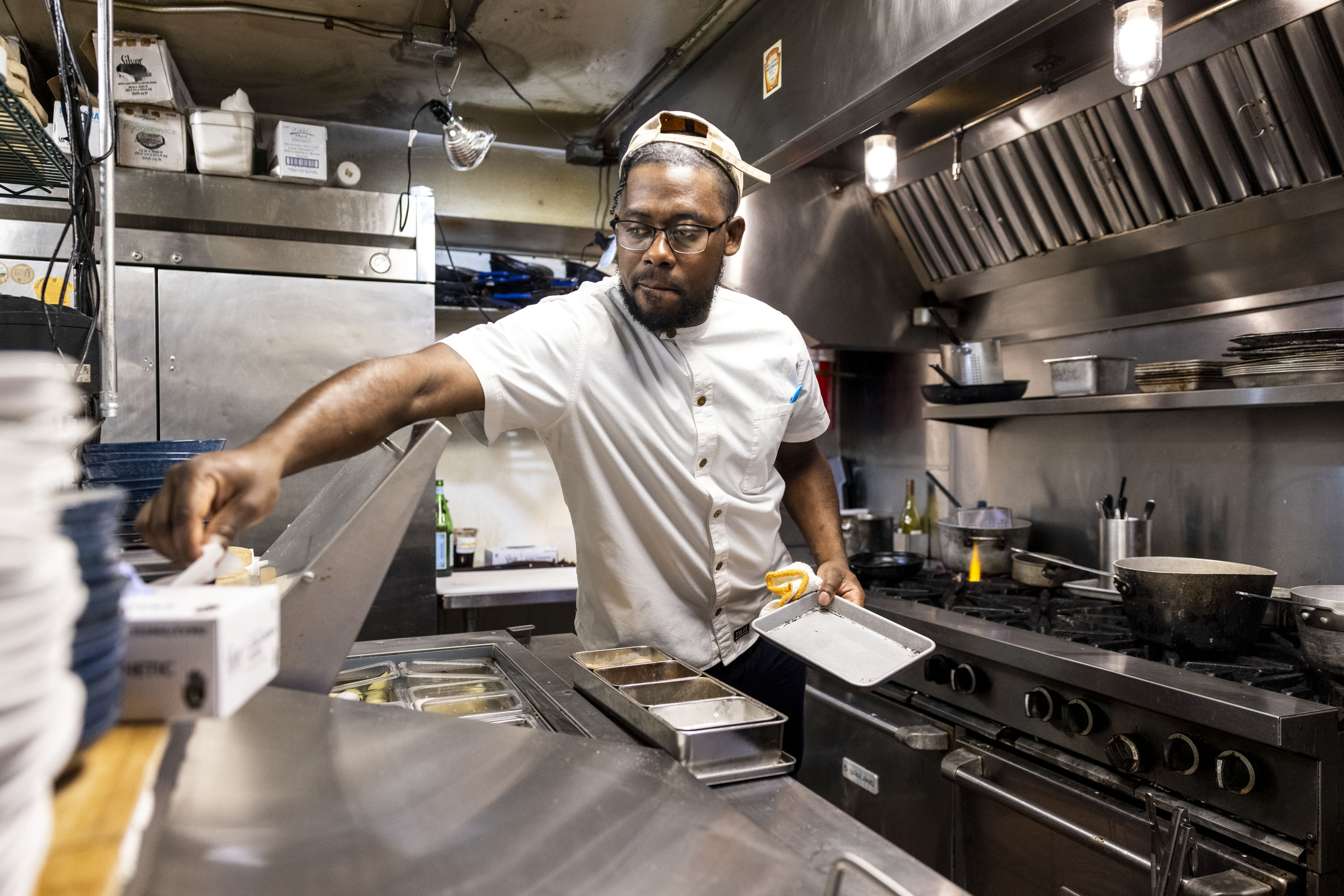 Chef Ty McDuffie works in the kitchen at Still Worldly...