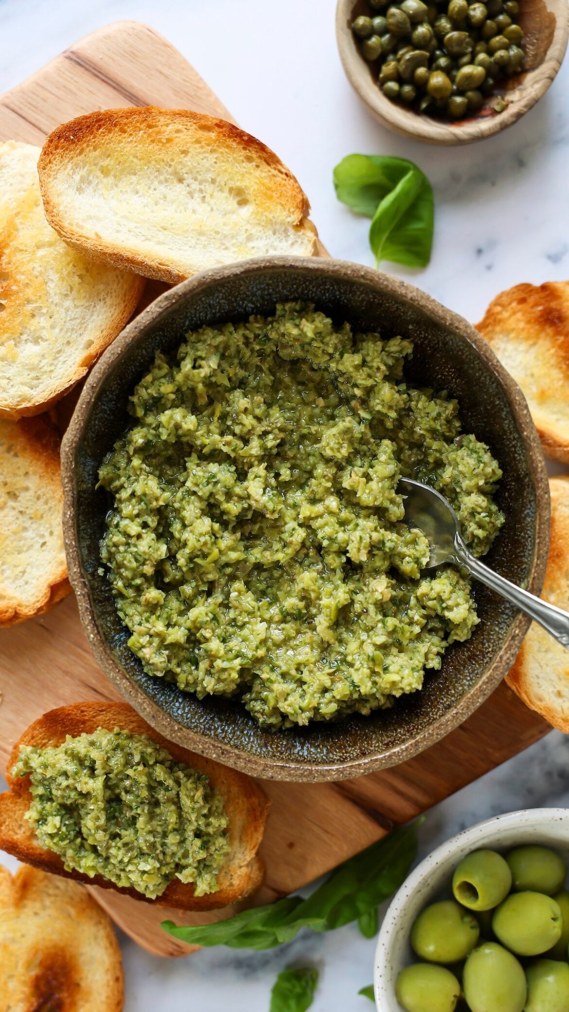Green Olive Tapenade – Easy Mediterranean Spread tapenade in serving bowl