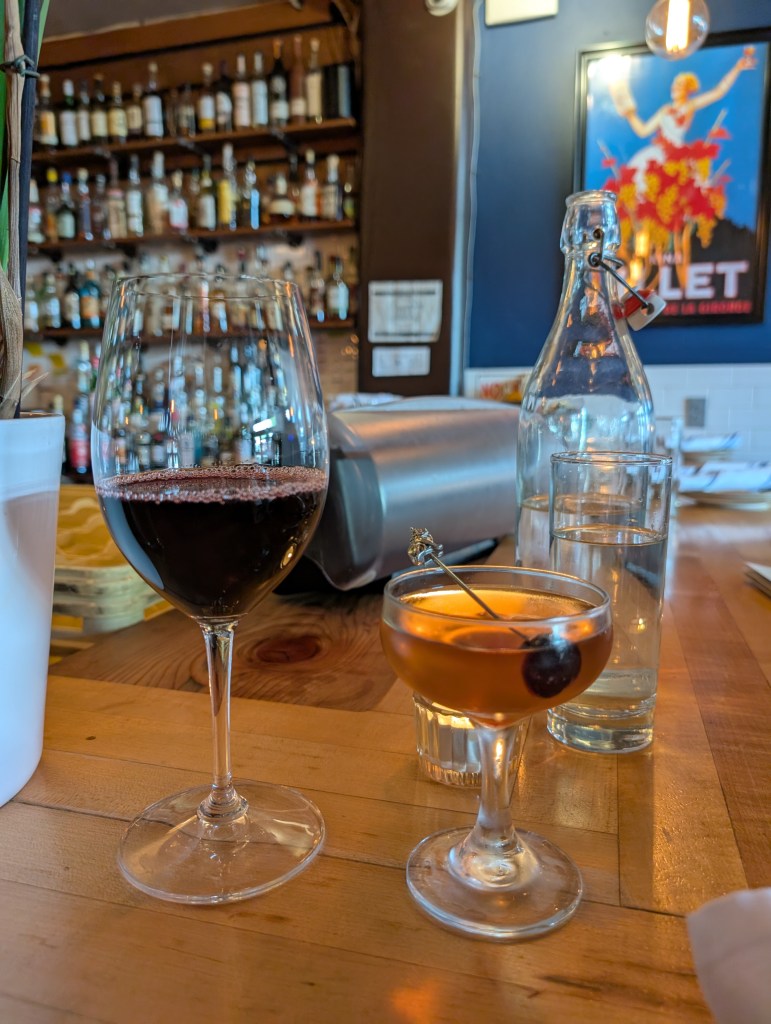 wine and cocktail glass at Bar Purlieu in Eugene