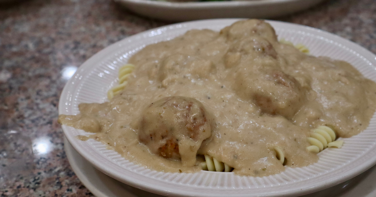 Swedish meatballs over pasta with gravy served with all you can eat soup Michigan.