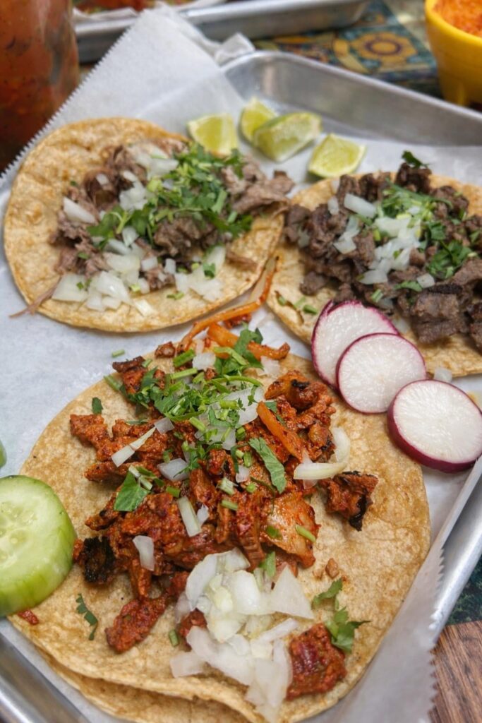 Decision time, where do I add the red or green salsa too. Pastor, steak, and goat.