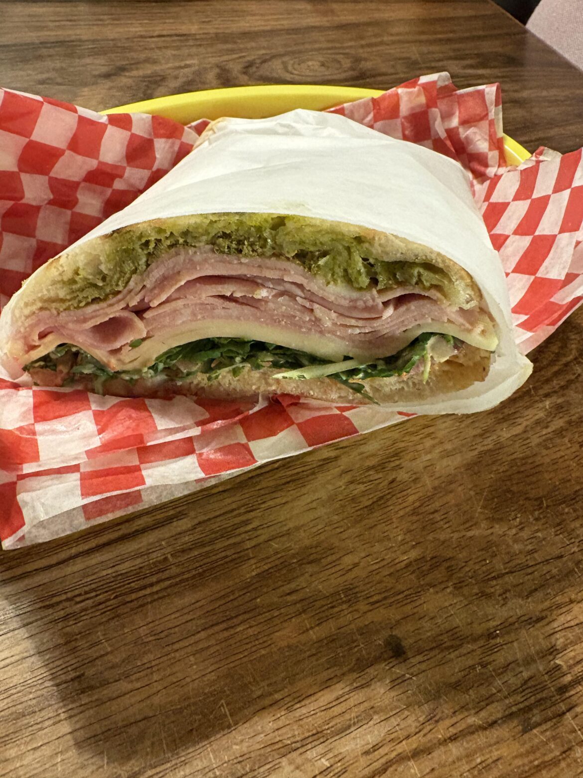 Mortadella. Pesto. Mayo mixed with chopped sundried tomatoes and grilled pepers. Gouda, red onions and arugola.