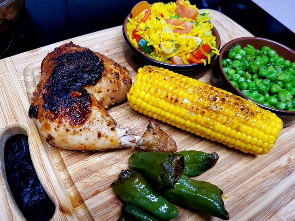 Nando's at Home - Peri Chicken, Spicy Vegetable Rice, Macho Peas (Yum), Corn and Chilli Cheese Padrons.