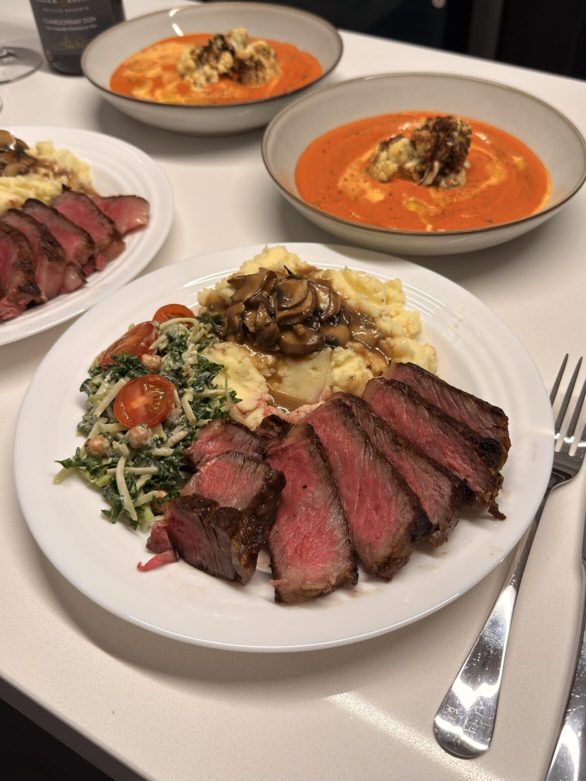 Ribeye and accompanying sides