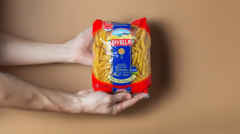 Person holding pasta bag