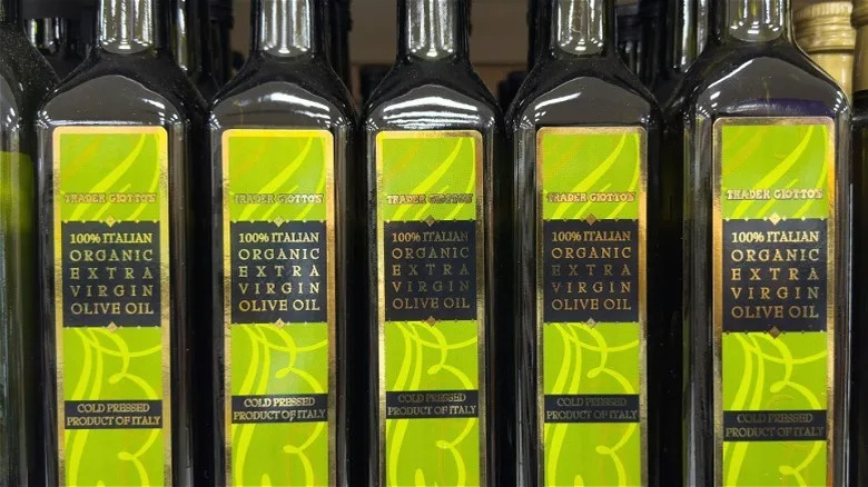 Trader Joe's Italian organic extra-virgin olive oil bottles on a shelf