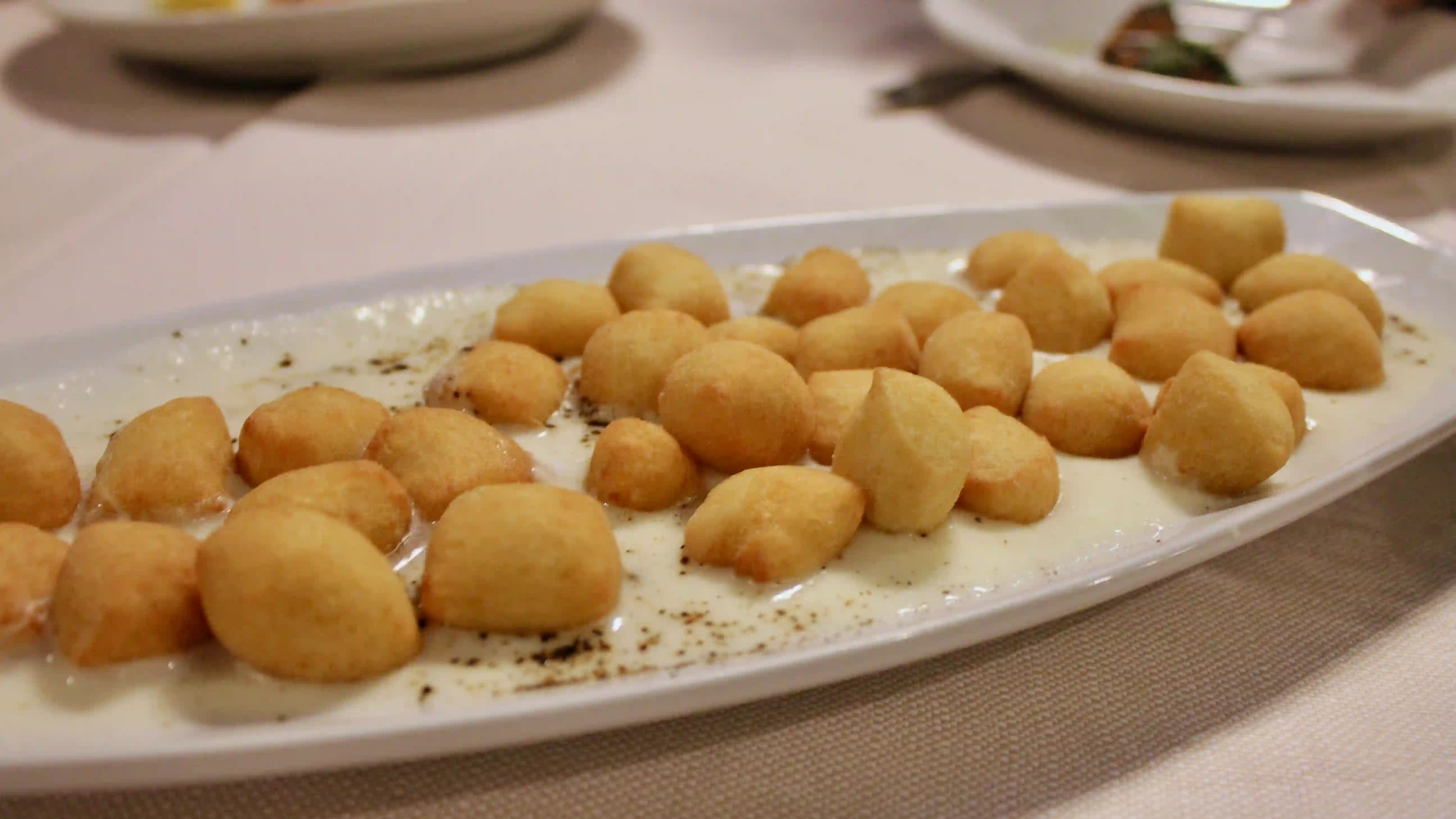 cesare al casaletto - fried gnocchi with cacio e pepe