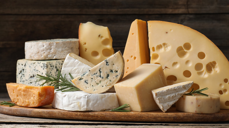 Selection of cheeses on cutting board